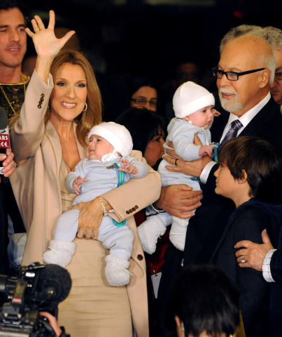 Celine Dion greets fans upon her arrival at Caesars Palace in Las Vegas on Feb. 16, 2011, to prepare for the March debut of her three-year engagement at The Colosseum at Caesars.Dion arrived with  ...