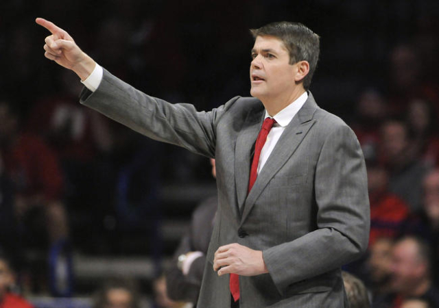 UNLV Rebels head coach Dave Rice signals during the second half against the Arizona Wildcats at McKale Center. Arizona won 82-70. Mandatory Credit: Casey Sapio-USA TODAY Sports