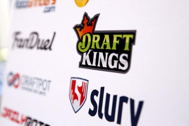 A DraftKings logo is displayed on a board inside of the DFS Players Conference in New York November 13, 2015. (Lucas Jackson/Reuters)