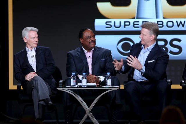 Sean McManus, left, chairmen of CBS Sports, James Brown, center, host of The Super Bowl Sunday and Phil Simms, analyst for Super Bowl 50 on CBS Sports appear at the CBS Sports panel at the Televis ...