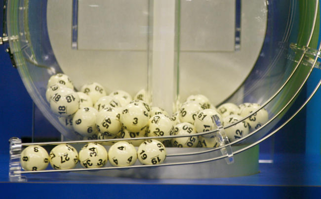 The winning Powerball numbers are shown after being drawn at the Florida Lottery studio in Tallahassee, Florida January 13, 2016. The winning numbers are 8-27-34-4-19 and the Powerball number is 1 ...