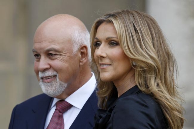 Canadian singer Celine Dion poses with husband Rene Angelil after she was awarded with France‘s Legion d‘Honneur in Paris, May 22, 2008. Angelil died Jan. 14, 2016, at the age of 73 af ...