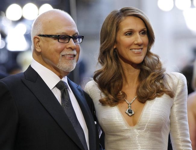 Singer Celine Dion and her husband, Rene Angelil, arrive at the 83rd Academy Awards in Hollywood, California, Febr.  27, 2011. (Mario Anzuoni/Files/Reuters)