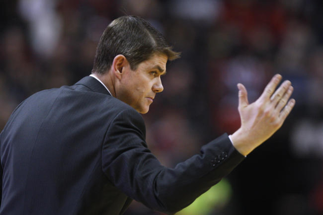 UNLV head coach Dave Rice motions for his players to get up the floor during the second half of their Mountain West Conference game against Boise State Wednesday, Feb. 18, 2015, at the Thomas &amp ...