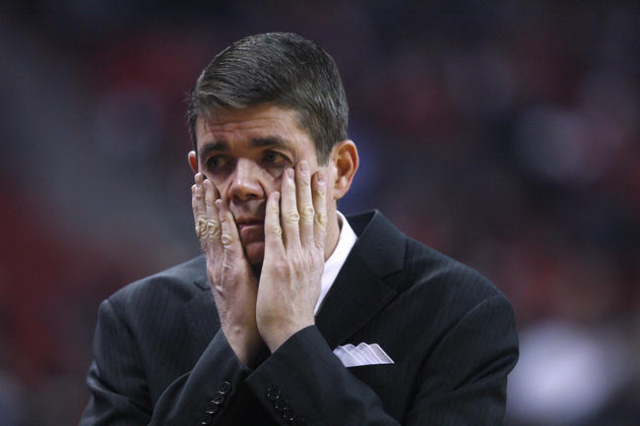 UNLV head coach Dave Rice reacts after a botched play during the first half of their Mountain West Conference game against New Mexico Friday, Jan. 9, 2015 at the Thomas & Mack Center. (Sam Mor ...