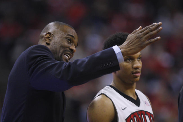 UNLV assistant coach Stacey Augmon talks to UNLV guard Rashad Vaughn during the first half of their Mountain West Conference game against New Mexico Friday, Jan. 9, 2015 at the Thomas & Mack C ...