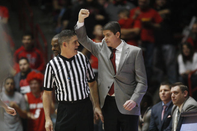 UNLV head coach Dave Rice questions a call by official Brad Ferrie during the first half of their Mountain West Conference game Saturday, Feb. 21, 2015, at The Pit in Albuquerque. (Sam Morris/Las  ...
