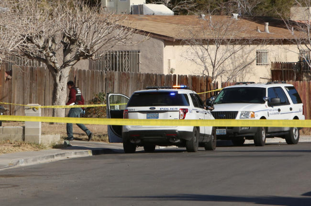 North Las Vegas police are investigating a homicide at a house in the 1200 block of Ferguson Avenue, near the intersection of Evans Avenue and Civic Center Drive, on Monday, Jan. 25, 2016. (Bizua ...