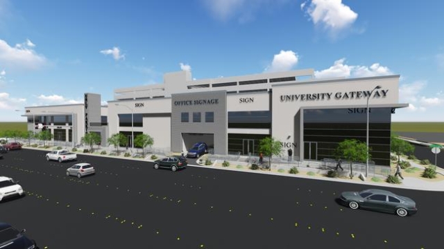A rendering shows a view of the University Gateway project, an $18 million complex that includes a 7-story parking garage. Officials broke ground on the project on Tuesday. Courtesy, Frank Marrett ...