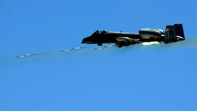 An A-10 Thunderbolt II attack aircraft launches rockets while making an attack run during a Force Firepower demonstration at Point Bravo north of Nellis Air Force Base Friday, Sept. 14, 2007. JOHN ...