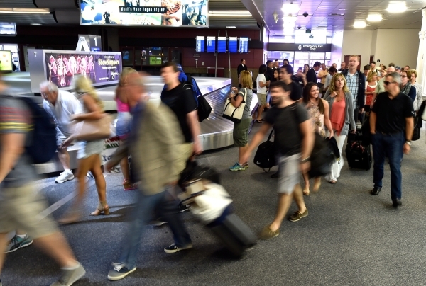 Passengers arrive at the baggage claim area at McCarran International Airport on Friday, Sept. 4, 2015, in Las Vegas. (David Becker/Las Vegas Review-Journal)
