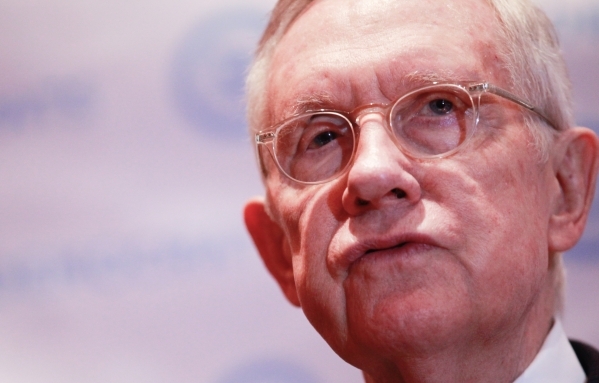U.S. Sen. Harry Reid, D-Nev., speaks with news media ahead of the CNN Democratic presidential debate at the Wynn hotel-casino in Las Vegas on Tuesday, Oct. 13, 2015. Chase Stevens/Las Vegas Review ...