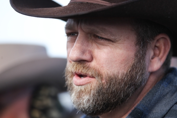 Ammon Bundy, right, speaks during a news conference by the entrance of Malheur National Wildlife Refuge headquarters near Burns, Ore. on Wednesday, Jan. 6, 2016. Chase Stevens/Las Vegas Review-Jou ...