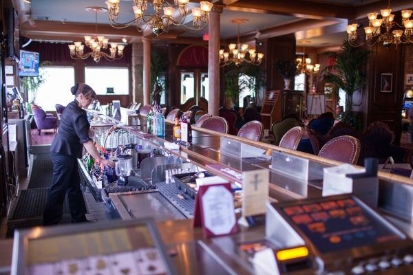 Bartender Michele Brandt works at the Mizpah Hotel in Tonopah on Thursday, Jan. 28, 2016. California vintners Nancy and Fred Cline, owners of Cline Cellars winery in Sonoma, Calif., restored and o ...