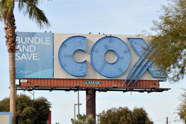 A billboard advertising cable provider Cox Communications is seen Friday, Jan. 22, 2016, in Las Vegas. The Las Vegas cable provider and KLAS, the local CBS affiliate, are currently in a negotiatio ...