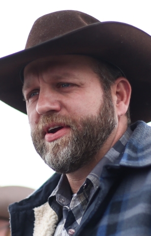 Ammon Bundy speaks with reporters at a news conference by the entrance of Malheur National Wildlife Refuge headquarters near Burns, Ore. on Tuesday, Jan. 5, 2016. Bundy, who is the son of Nevada R ...