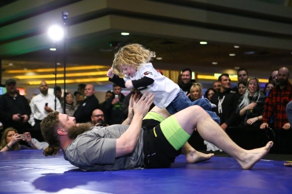 Roy Nelson, left, with his son Jaxson, 3, participates in an open workout ahead of UFC Fight Night 82 at the MGM Grand hotel-casino in Las Vegas on Thursday, Feb. 4, 2016. Chase Stevens/Las Vegas ...