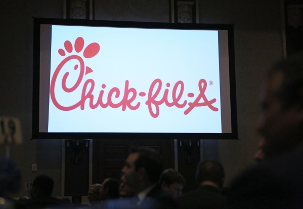 A slide advertising Chic-fil-A restaurant is shown during the annual State of the City address at Green Valley Ranch hotel-casino Wednesday, Feb. 3, 2016, in Henderson. Mayor Andy Hafen reflected  ...