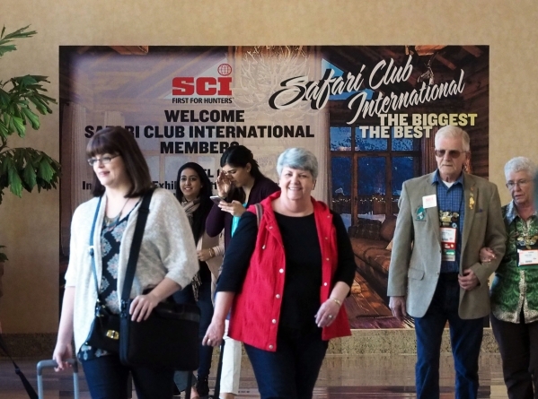 People walk by the sign welcoming people to the Safari Club International convention at the Mandalay Bay Resort and Casino in Las Vegas, Wednesday, Feb. 3, 2016. Jerry Henkel/Las Vegas Review-Journal