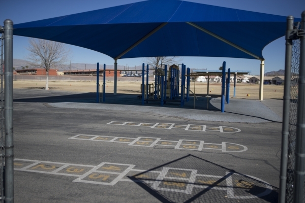 A Lomie Heard Elementary School playground inside Nellis Air Force Base is seen on Tuesday, Feb. 9, 2016, in Las Vegas. The school will close its doors at the end of the school year and will be re ...