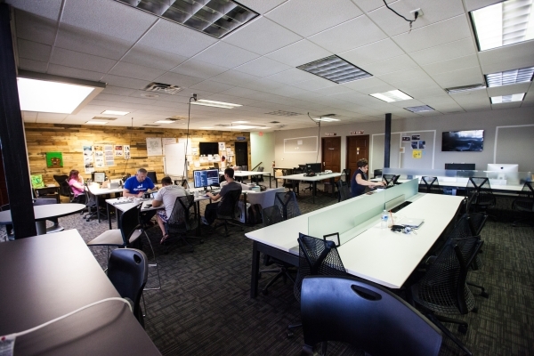 People work in open office spaces at Work in Progress, 317 6th St., in downtown Las Vegas on Tuesday, May 5, 2015. Work in Progress, which offers work stations and and startup services for individ ...