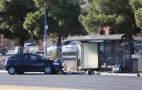 Las Vegas Police investigate a bus stop that a car crashed into on Lake Mead Boulevard west of Rancho Drive the won Thursday, Feb. 4, 2016 in Las Vegas. Brett Le Blanc/Las Vegas Review-Journal Fol ...