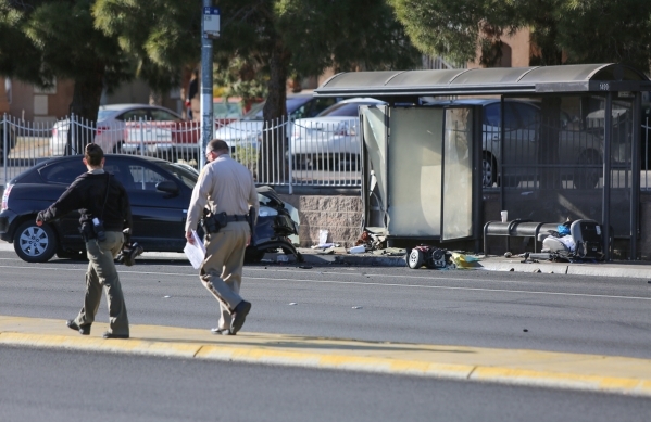 Las Vegas Police investigate a bus stop that a car crashed into on Lake Mead Boulevard west of Rancho Drive the won Thursday, Feb. 4, 2016 in Las Vegas. Brett Le Blanc/Las Vegas Review-Journal Fol ...
