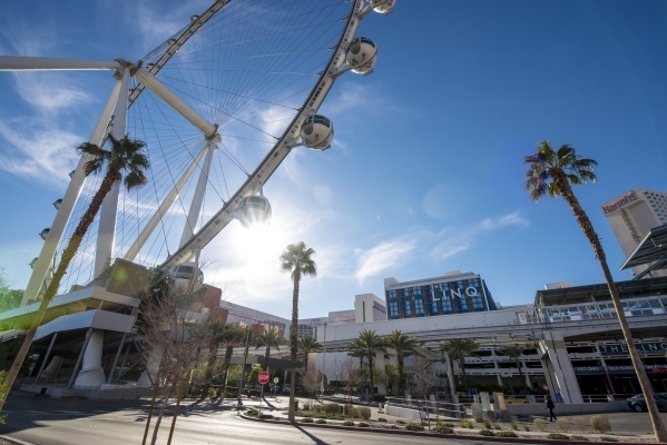 The High Roller carries passengers with The Linq Hotel, 3535 Las Vegas Boulevard South, in the background on Thursday, Feb. 4, 2016. Joshua Dahl/Las Vegas Review-Journal