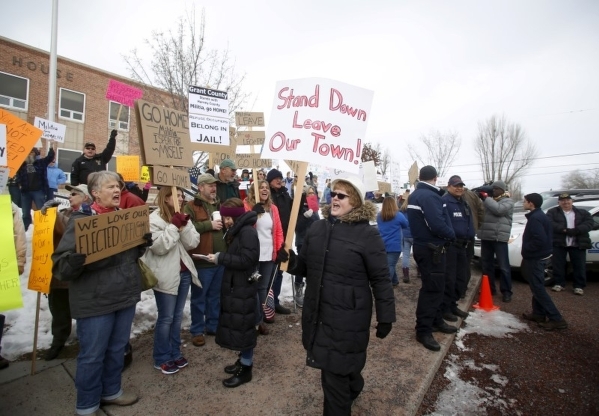 Anti-militia protestors picket outside the Harney County Courthouse in Burns, Ore., on Thursday, Feb. 11, 2016. Jim Urquhart/Reuters