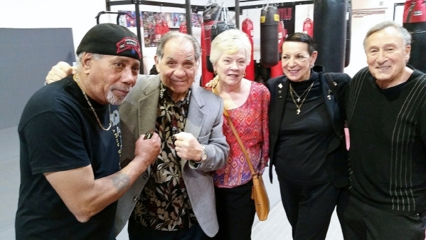 Former undisputed welterweight boxing champion Tony DeMarco, second from left, poses for a photo at the Long Life Fighter Gym on Patrick Lane in Las Vegas on Feb. 9, 2016. Others pictured, from le ...
