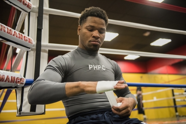 Professional boxer and former IBF welterweight champion "Showtime" Shawn Porter is seen wrapping up his hands with tape at his gym, the Porter Hy-Performance center, in Las Vegas on Thur ...