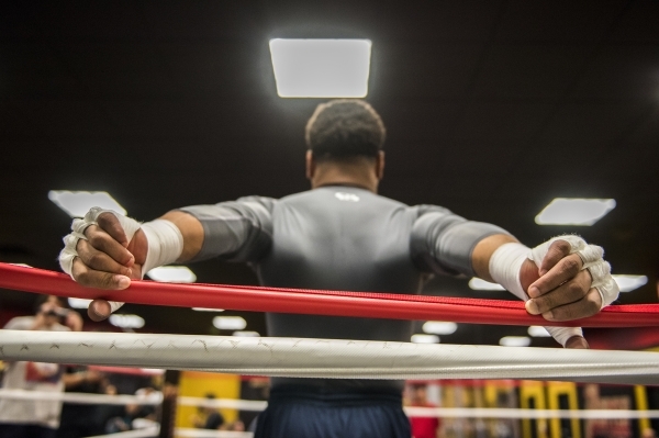 Professional boxer and former IBF welterweight champion "Showtime" Shawn Porter is seen stretching at his gym, the Porter Hy-Performance center, in Las Vegas on Thursday, Feb. 18, 2016. ...
