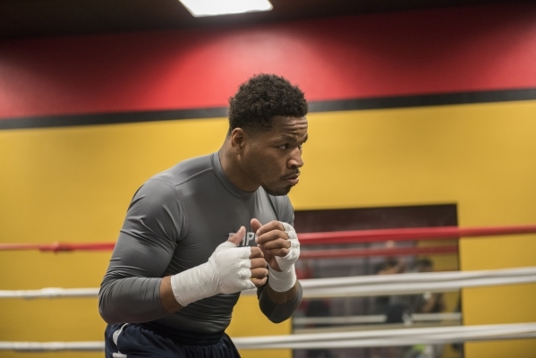 Professional boxer and former IBF welterweight champion "Showtime" Shawn Porter is seen shadow boxing at his gym, the Porter Hy-Performance center, in Las Vegas on Thursday, Feb. 18, 201 ...