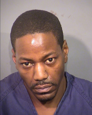 Thirty-six-year-old Tolavius Timmons is shown in his booking mug shot from Las Vegas police.