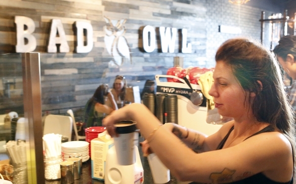 Kaley Nicholson, barista at Bad Owl Coffee on 10575 S. Eastern Ave., in Henderson, delivers customer‘s order on Friday, Feb. 19, 2016. Bad Owl Coffee had its grand opening Feb. 13 and offers ...