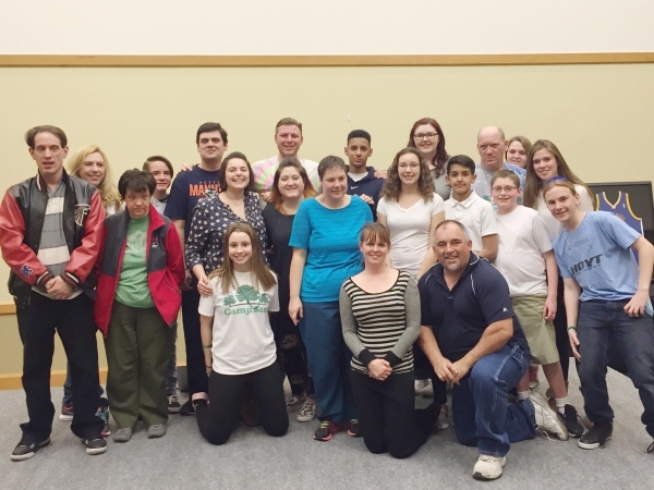 Members of the Templ Sinai Youth Group and Camp Sam USA staff and campers pose Feb. 9 during a spaghetti fundraiser that raised $1,680 for the camp. Special to View