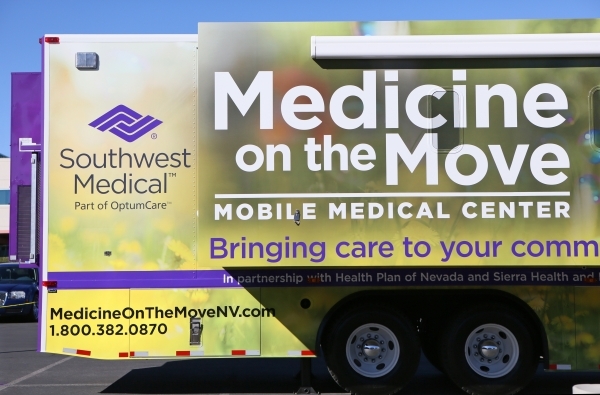 A mobile medical center is shown outside UnitedHealthcare/Southwest Medical Associates headquarters Monday, Feb. 22, 2016, in Las Vegas. The 45-foot trailer is equipped with two patient exam rooms ...
