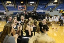 Faith Lutheran celebrates after a 50-47 victory over Spring Valley in the NIAA Division I-A ...