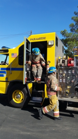 Fire department hopefuls participate in a Citizens Fire Academy put on by Workforce Connections and local fire departments in October to give candidates a test of fire service. Though the fire dep ...