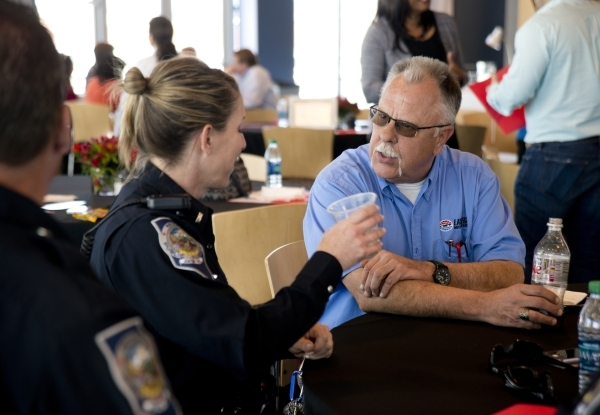 George Brazzale, right, and Lt. Dawn Alterhofen talk after a press conference concerning traffic planning for the NASCAR Kobalt Tools 400 at the speedway on Wednesday, Feb. 24, 2016. Daniel Clark/ ...