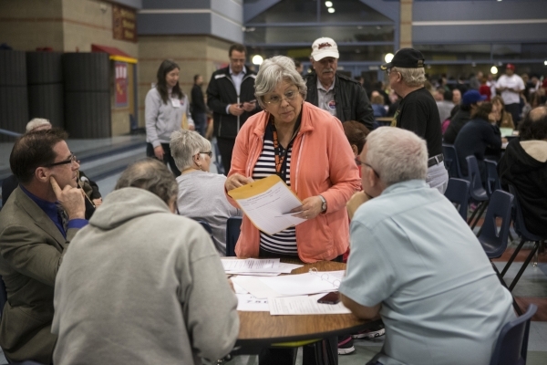 Information volunteer Jeannie Brewer answers questions during the Nevada Republican caucus at Del Sol High School on Tuesday, Feb. 23, 2016, in Las Vegas. Erik Verduzco/Las Vegas Review-Journal Fo ...