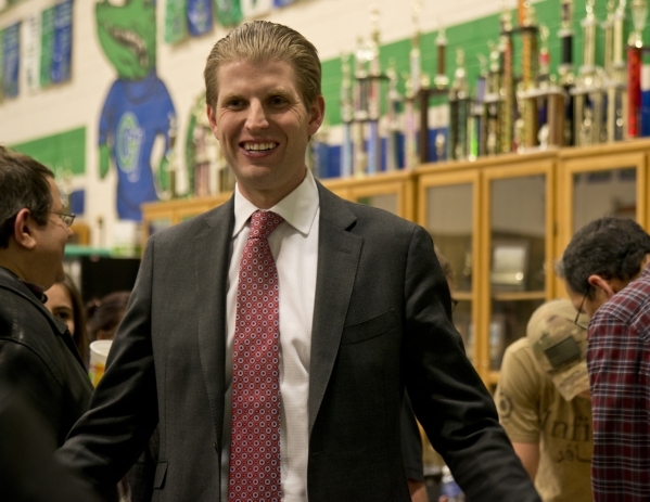 Eric Trump, the son of GOP presidential candidate Donald Trump, speaks with supporters inside Green Valley High School during the Nevada Republican presidential caucus in Henderson on Tuesday, Feb ...