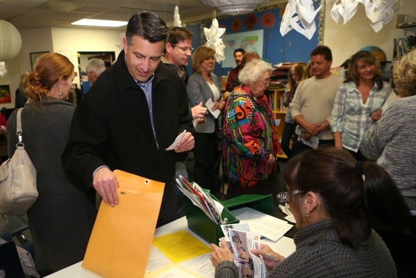 Gov. Brian Sandoval cast the first ballot of his precinct at the Republican caucus at Caughlin Ranch Elementary School in Reno, Nev. on Tuesday, Feb. 23, 2016. Sandoval voted for Rubio but said it ...
