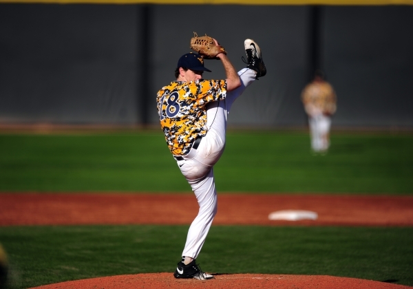 West Virginia starting pitcher Ross Vance delivers to UNLV in the fourth inning of their NCAA college Baseball game at Earl E. Wilson Stadium in Las Vegas Saturday, Feb. 27, 2016. West Virginia wo ...