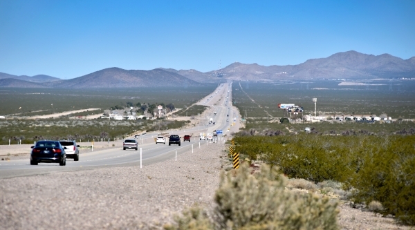 Motorists travel along U.S. Highway 95 near the town of Cal-Nev-Ari on Thursday, Feb. 25, 2016. Nancy and Slim Kidwell acquired 640 acres of land under the federal Pittman Land Act in 1965 which c ...