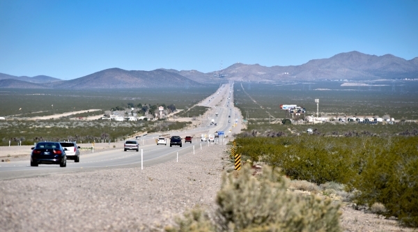 Motorists travel along U.S. Highway 95 near the town of Cal-Nev-Ari on Thursday, Feb. 25, 2016. Nancy and Slim Kidwell acquired 640 acres of land under the federal Pittman Land Act in 1965 which c ...