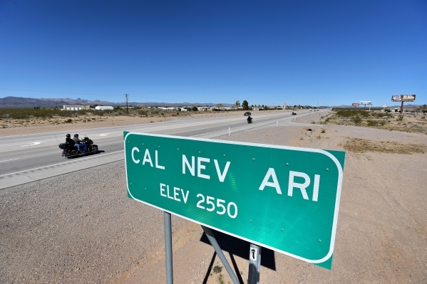 Motorists travel along U.S. Highway 95 near the town of Cal-Nev-Ari on Thursday, Feb. 25, 2016. Nancy and Slim Kidwell acquired 640 acres of land under the federal Pittman Land Act in 1965 which c ...