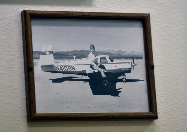 Town founder Nancy Kidwell is seen sitting on the wing of a single engine plane as it is displayed in her office at the Cal-Nev-Ari Casino Thursday, Feb. 25, 2016, in Cal-Nev-Ari. Kidwell, togethe ...