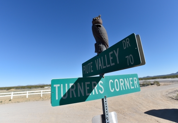 A plastic owl adorns the top of street signs Thursday, Feb. 25, 2016, in Cal-Nev-Ari. David Becker/Las Vegas Review-Journal Follow @davidjaybecker