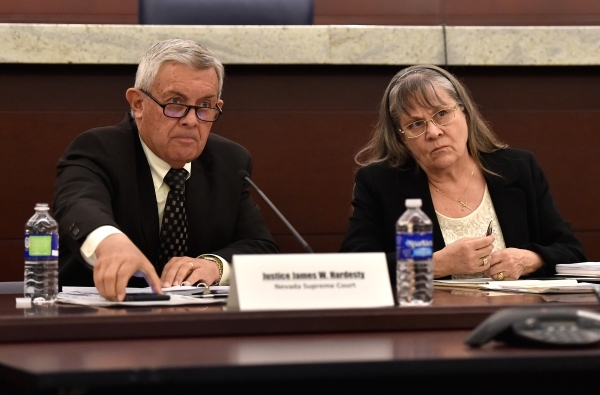 Nevada Supreme Justice James Hardesty, left, and Judge Cynthia Steel of the Eighth Judicial District listen to a speaker during the Nevada Supreme Court guardianship committee meeting at the Regio ...